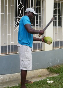 Dillon cutting open the coconuts with the machete!